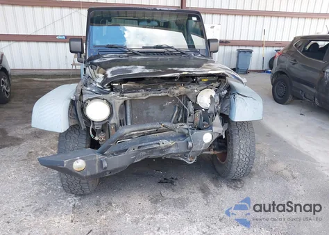 2011 Jeep Wrangler Sport z USA, uszkodzony, nr VIN 1J4AA2D17BL617455